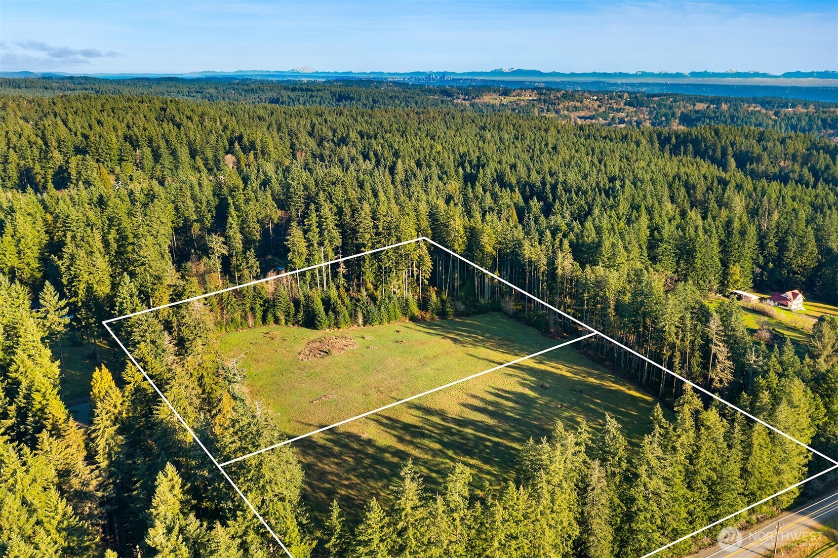 12302 Southwest 220th Street Vashon, WA 98070 - Photo 7 of 18 a view of a swimming pool with a balcony