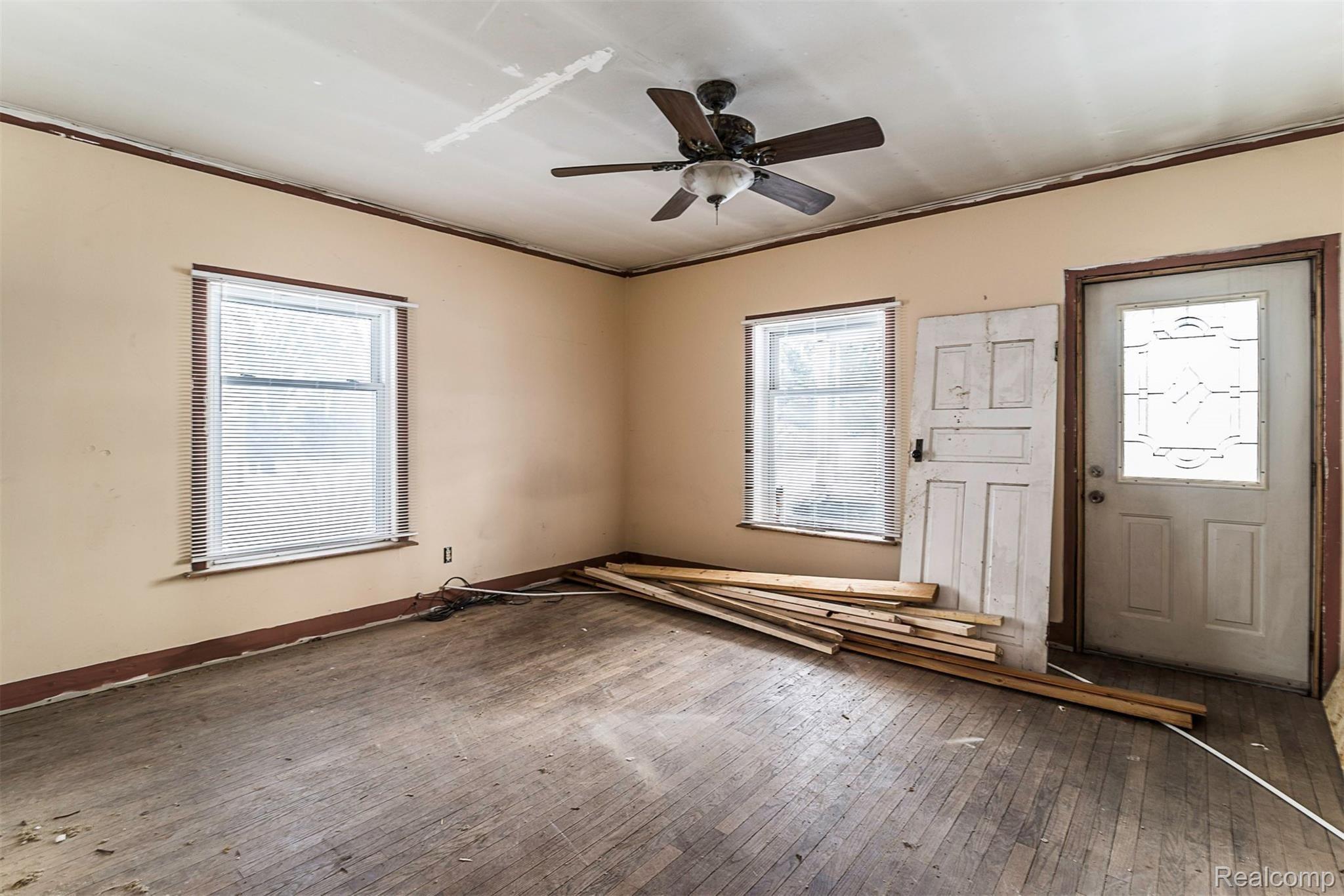 7840 West Lange Road Fowlerville, MI 48836 - Photo 6 of 38 Enter into the Living Room from the Front Door