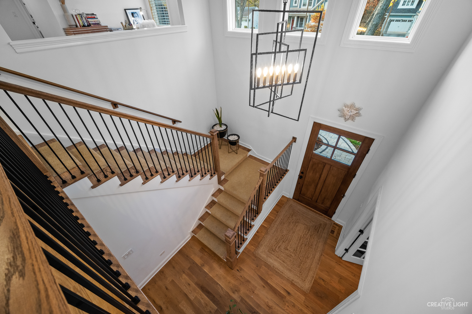601-1 Harger Road Oak Brook, IL 60523 - Photo 21 of 29 a view of staircase with wooden floor