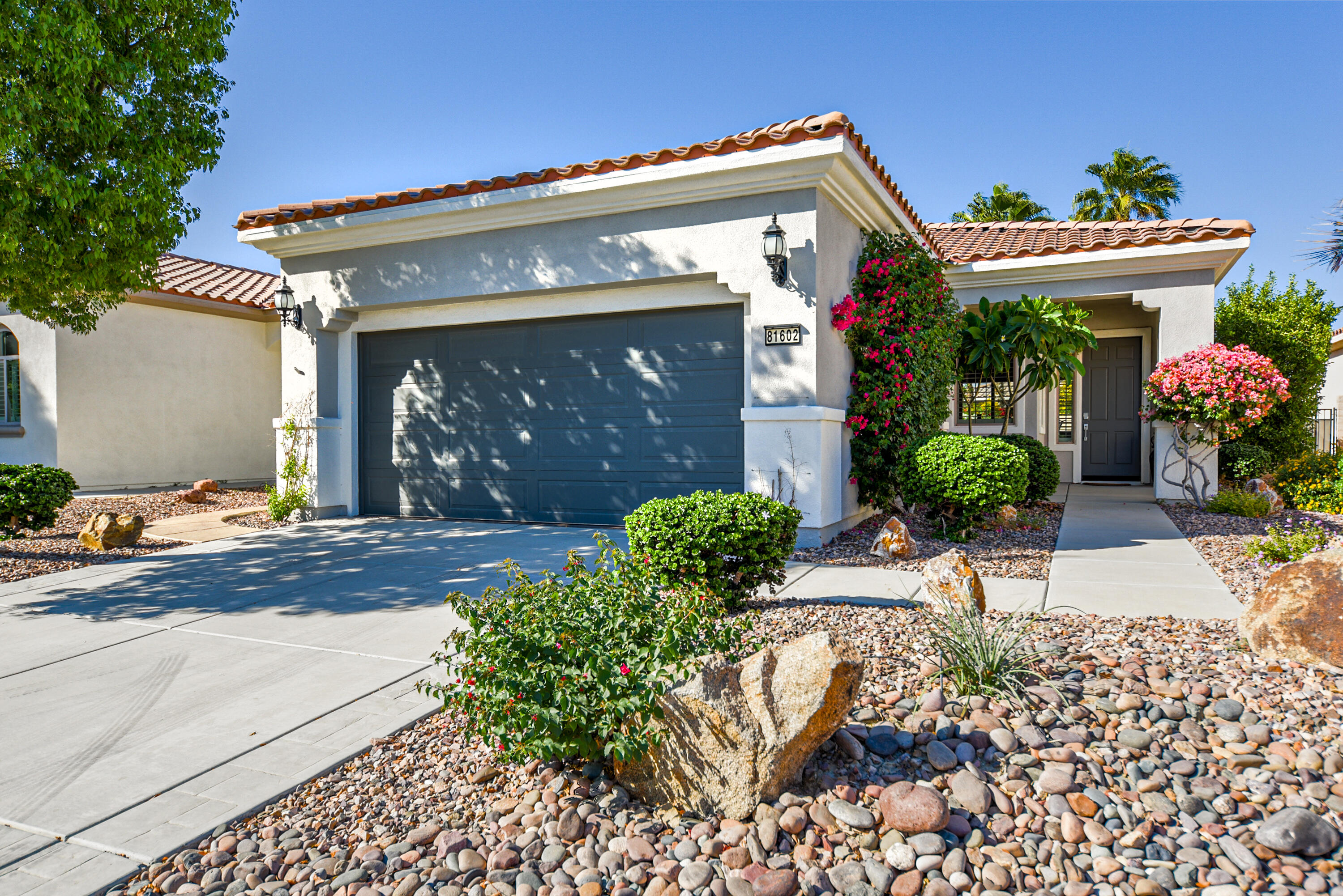 81602 Avenida Alturas Indio, CA 92203 - Photo 1 of 31 a front view of a house with a yard