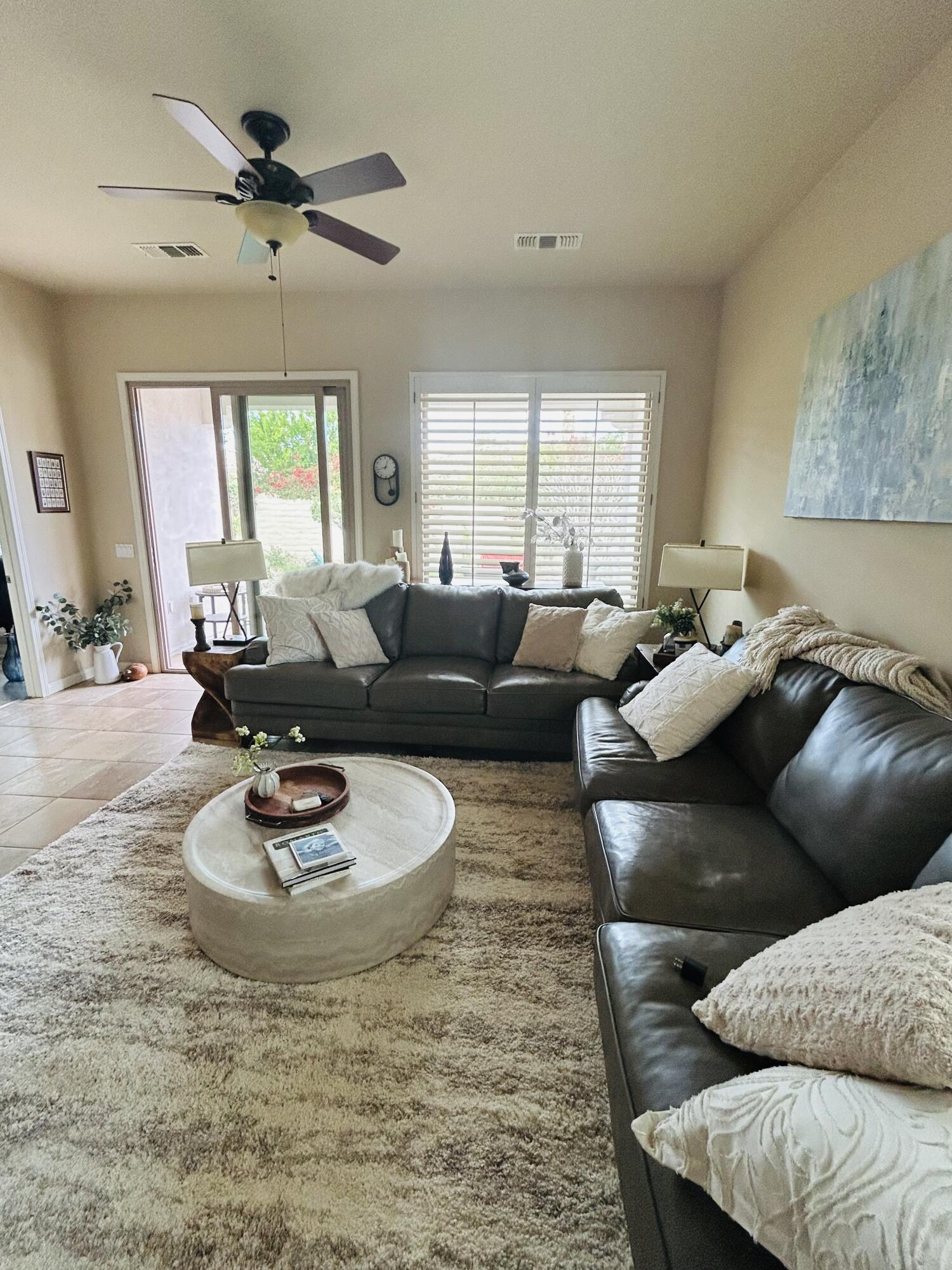 81602 Avenida Alturas Indio, CA 92203 - Photo 11 of 31 a living room with furniture and a wooden floor
