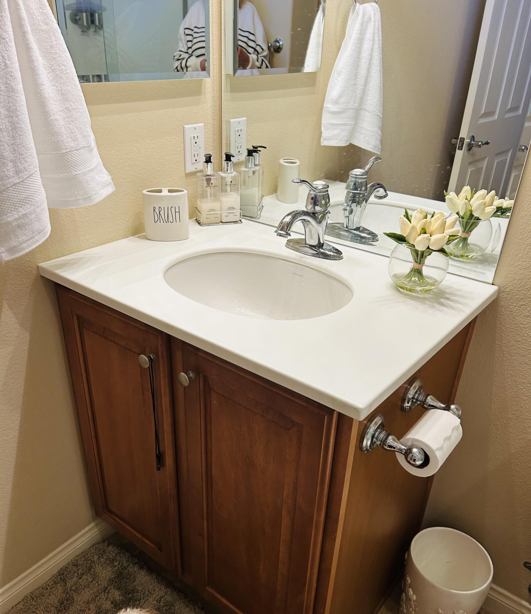 81602 Avenida Alturas Indio, CA 92203 - Photo 18 of 31 a bathroom with a sink mirror vanity and toilet