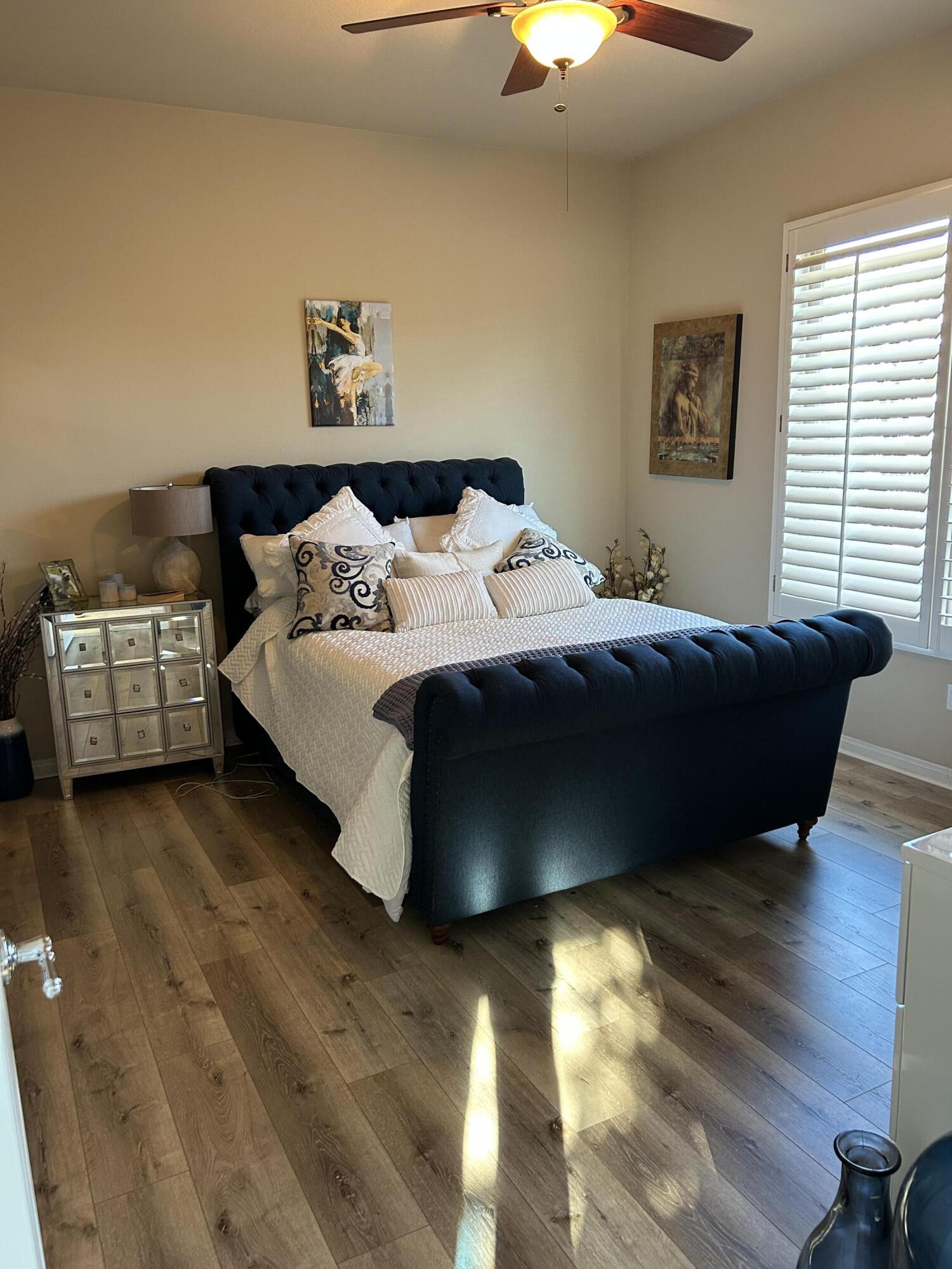 81602 Avenida Alturas Indio, CA 92203 - Photo 19 of 31 a bedroom with a bed and a couch