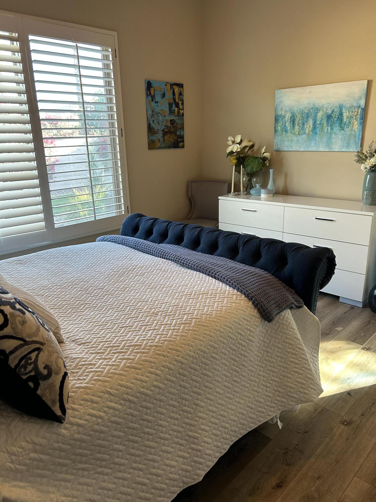 81602 Avenida Alturas Indio, CA 92203 - Photo 20 of 31 a bedroom with double bed and a window
