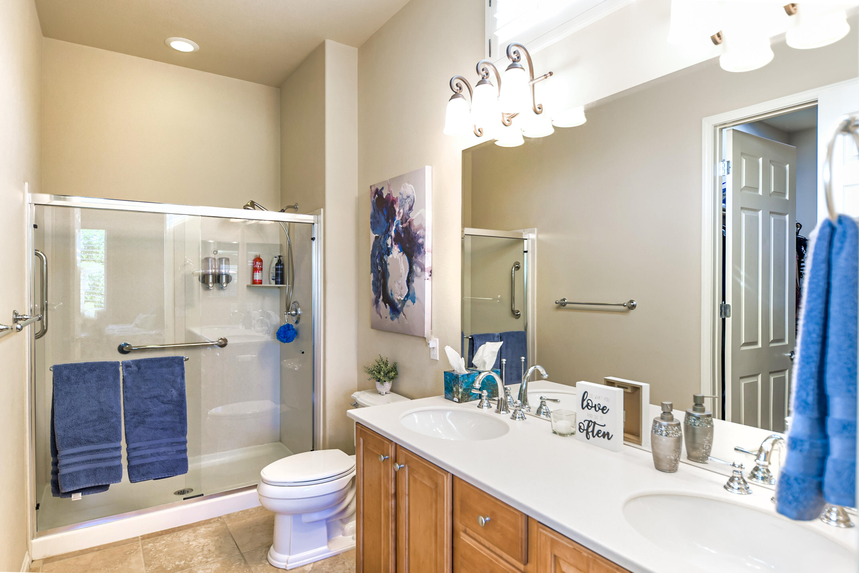 81602 Avenida Alturas Indio, CA 92203 - Photo 21 of 31 a bathroom with a sink a toilet and shower