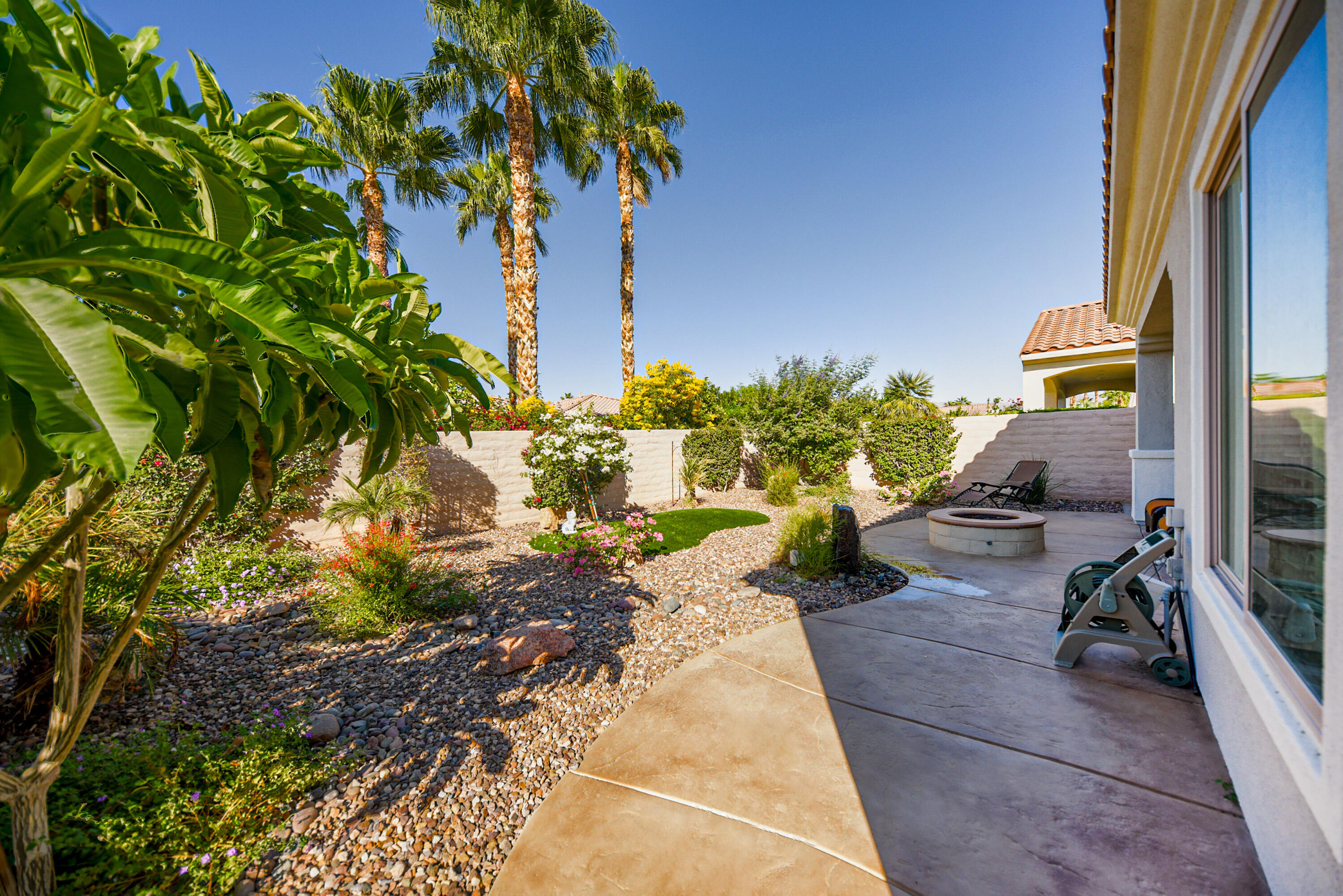 81602 Avenida Alturas Indio, CA 92203 - Photo 6 of 31 a garden view with a seating space