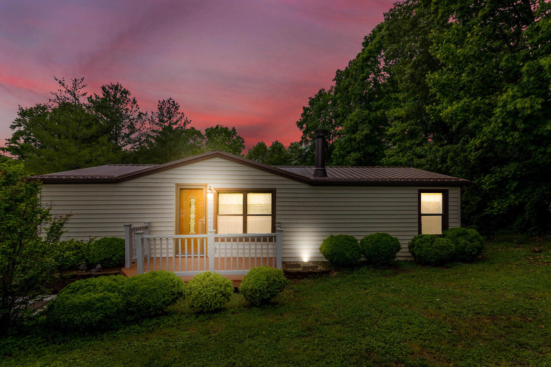 1577 Carroll Road Goodview, VA 24095 - Photo 1 of 40 a front view of a house with a yard