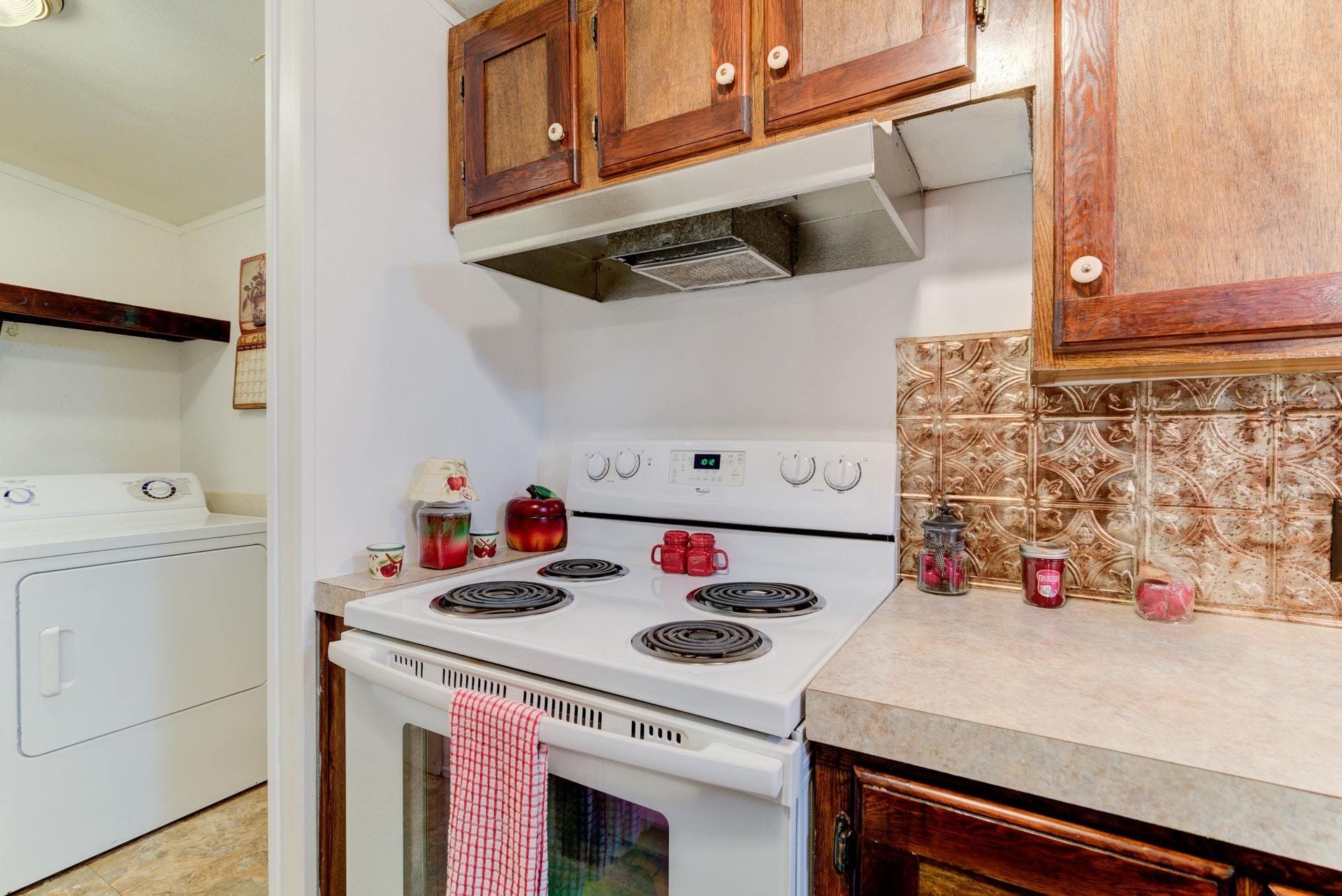 1577 Carroll Road Goodview, VA 24095 - Photo 14 of 40 a utility room with dryer and washer