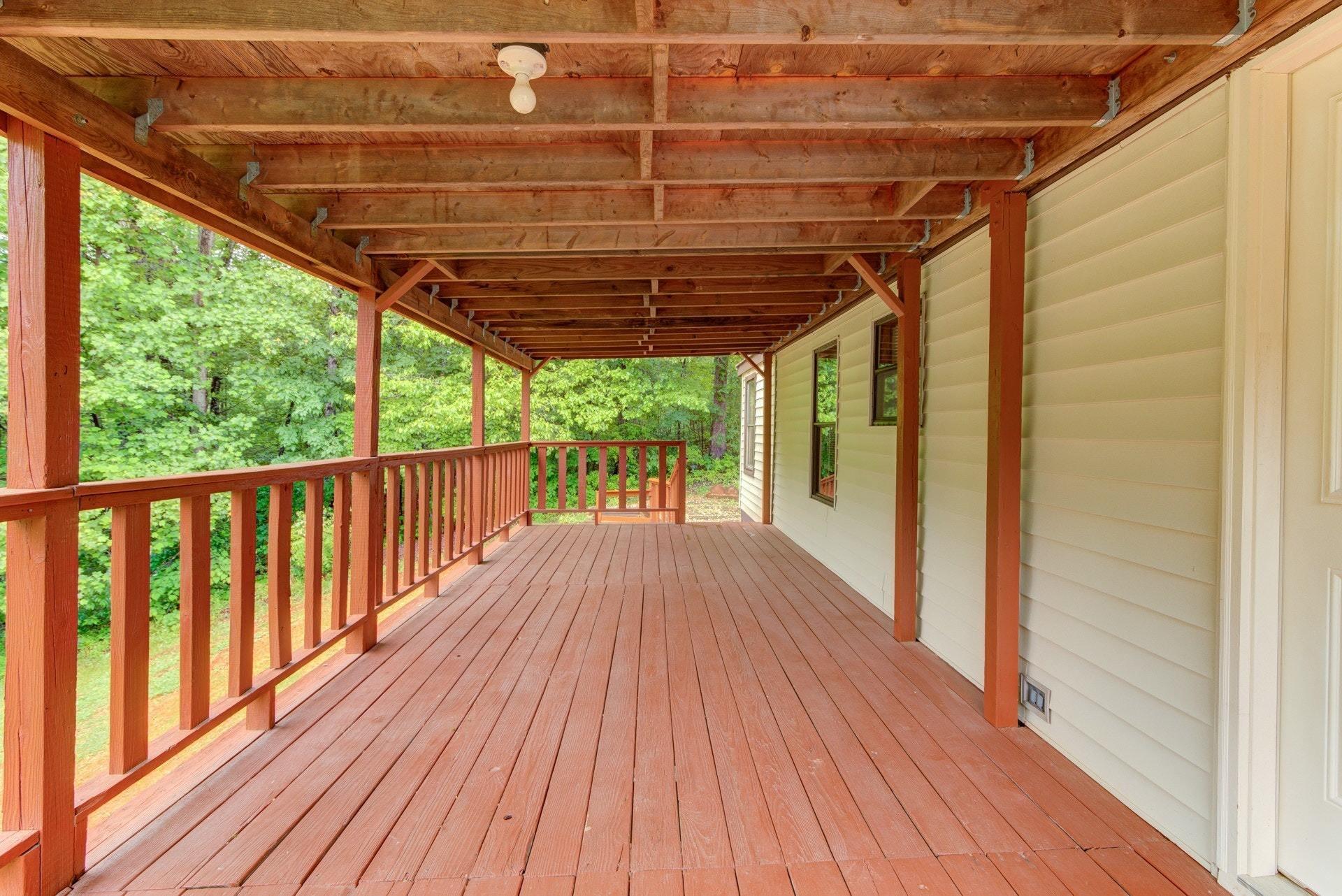 1577 Carroll Road Goodview, VA 24095 - Photo 23 of 40 a view of a wooden deck