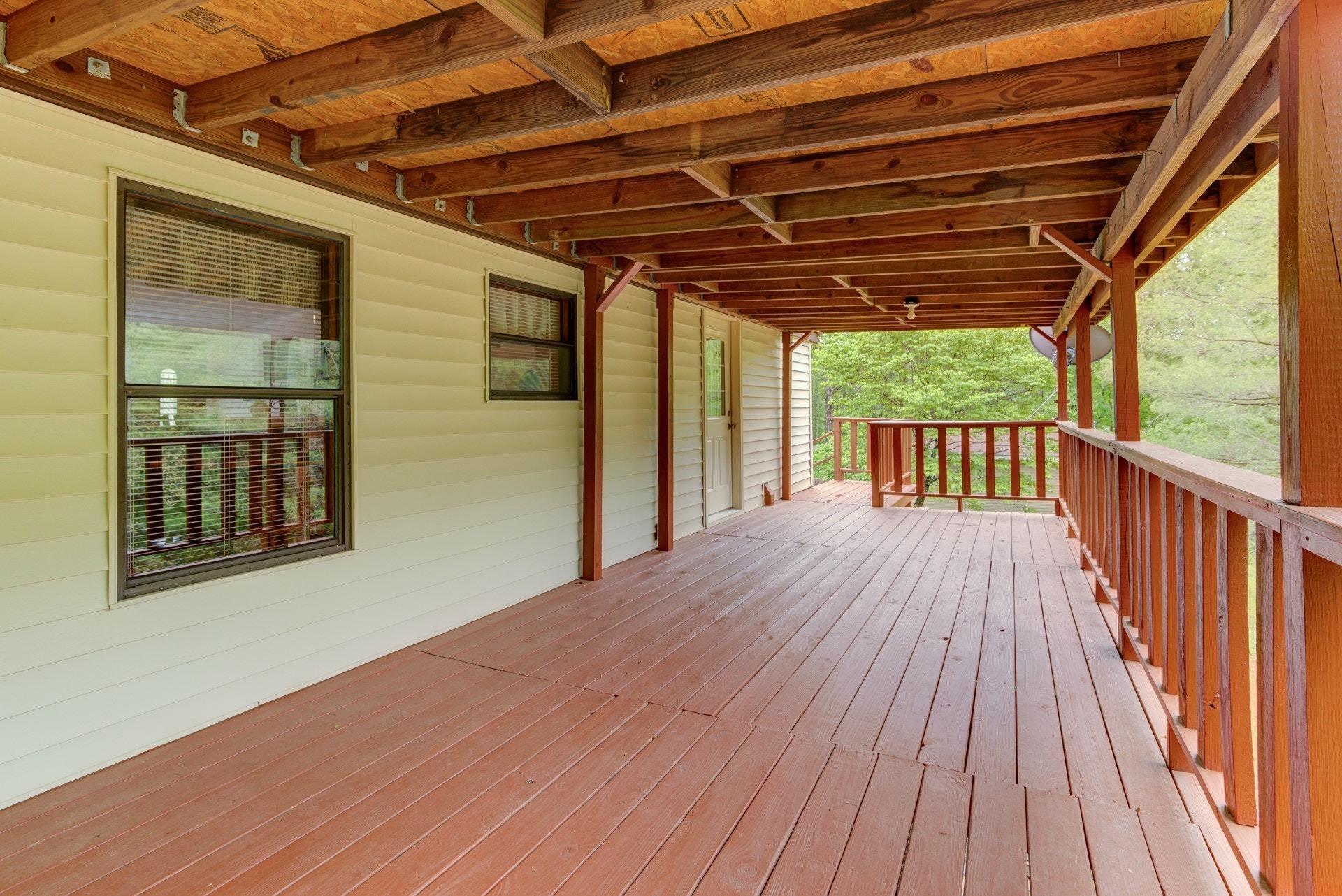 1577 Carroll Road Goodview, VA 24095 - Photo 25 of 40 a view of outdoor space with wooden floor and windows