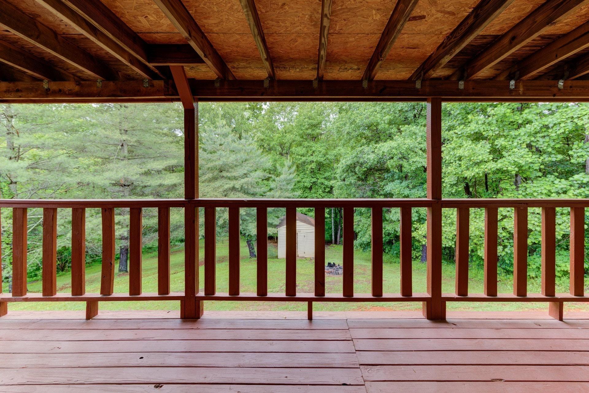 1577 Carroll Road Goodview, VA 24095 - Photo 26 of 40 a view of porch with a lots of trees and plants
