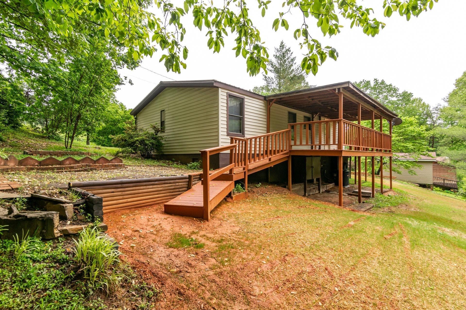1577 Carroll Road Goodview, VA 24095 - Photo 31 of 40 a view of a house with backyard and sitting area
