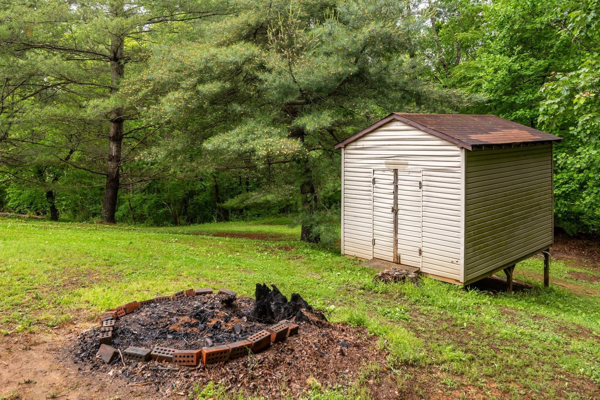 1577 Carroll Road Goodview, VA 24095 - Photo 32 of 40 a view of a backyard with a garden