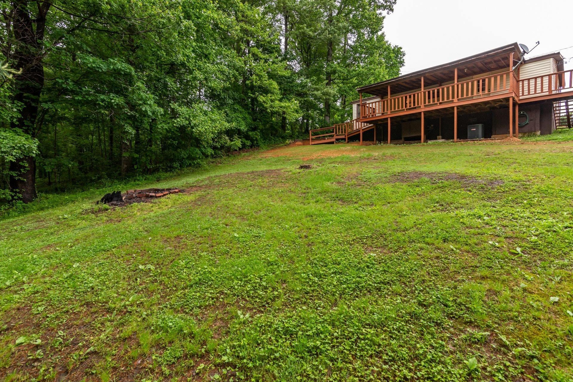 1577 Carroll Road Goodview, VA 24095 - Photo 36 of 40 a view of a house with a backyard