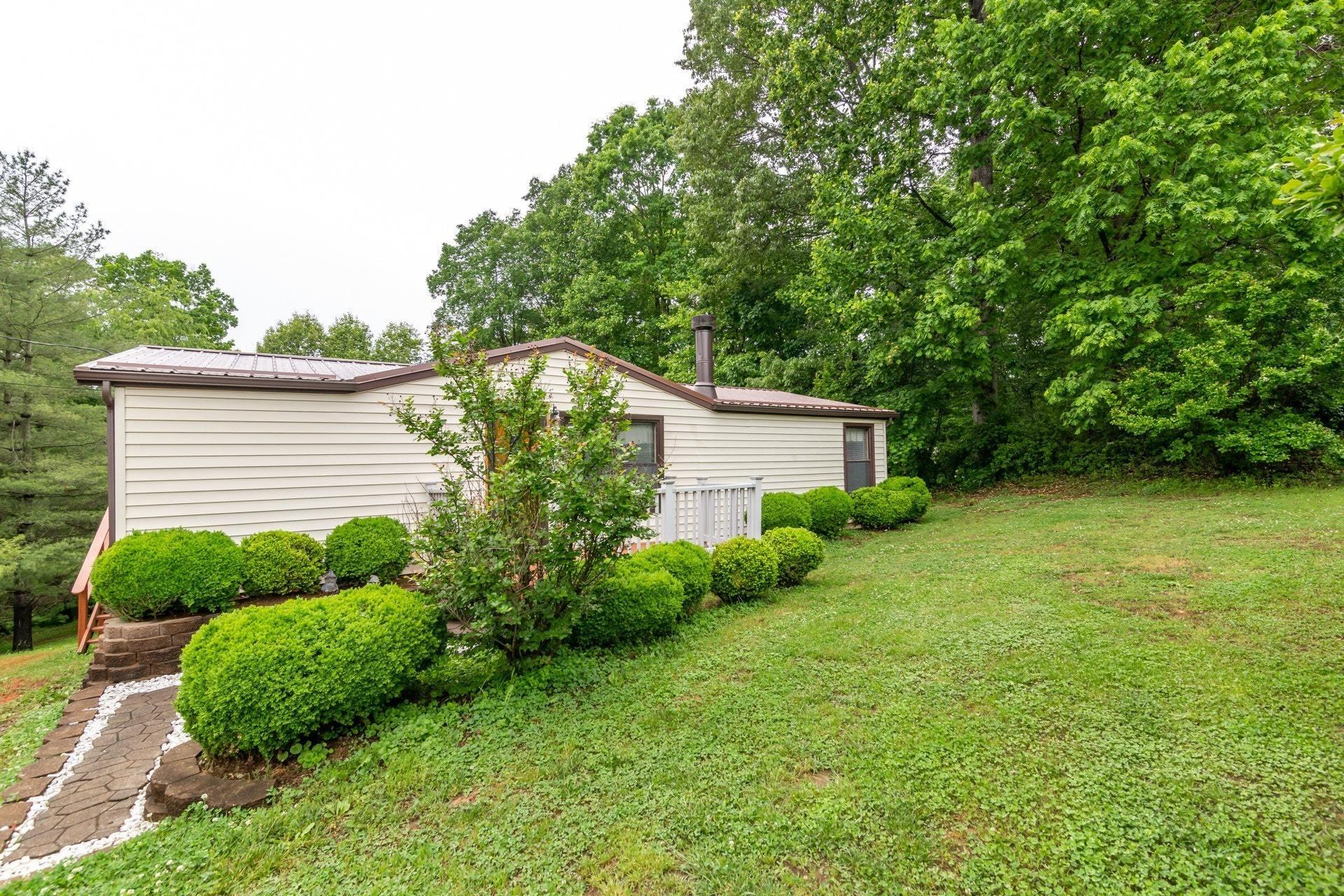 1577 Carroll Road Goodview, VA 24095 - Photo 39 of 40 a view of a house with a yard