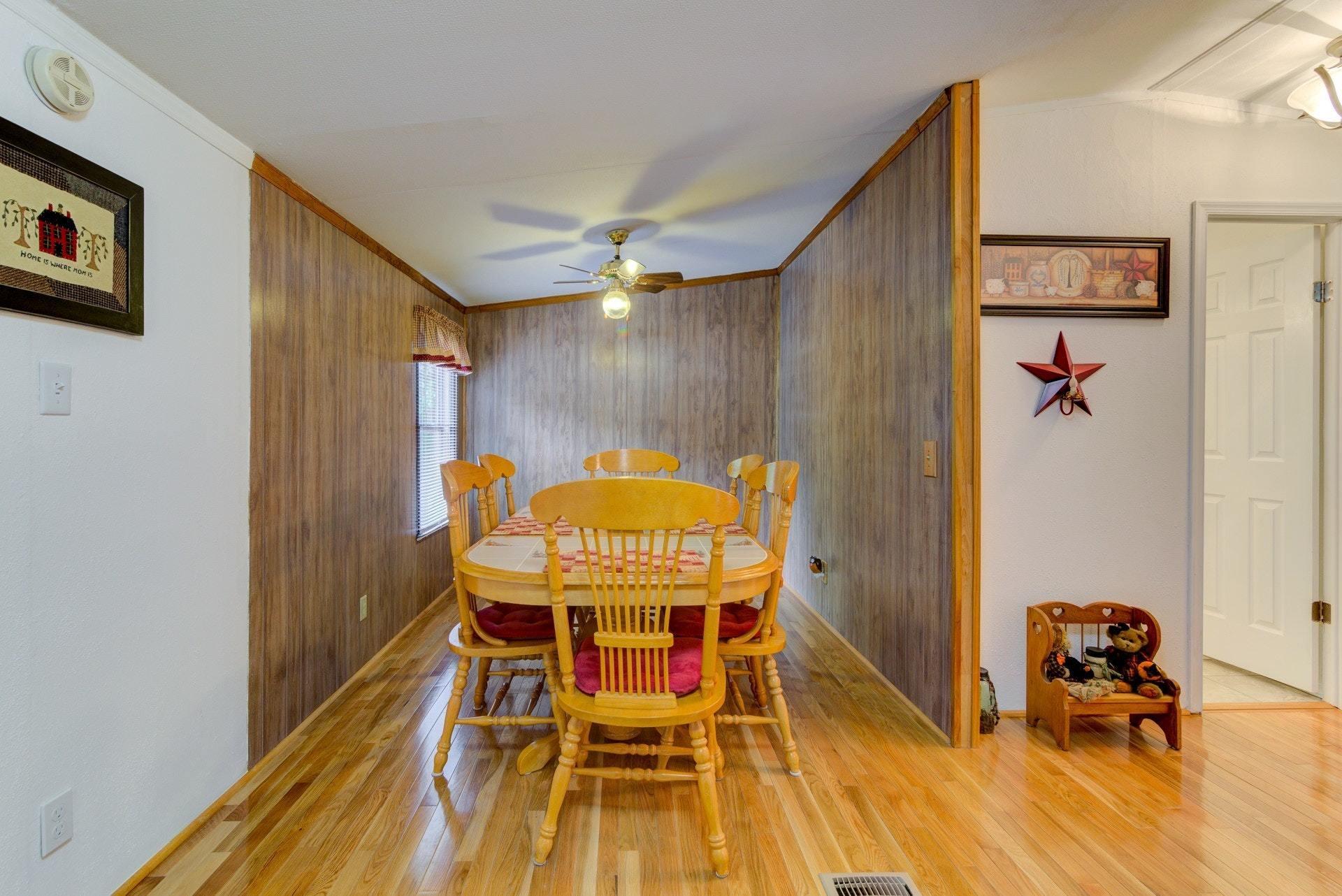 1577 Carroll Road Goodview, VA 24095 - Photo 9 of 40 a view of a livingroom with furniture and wooden floor
