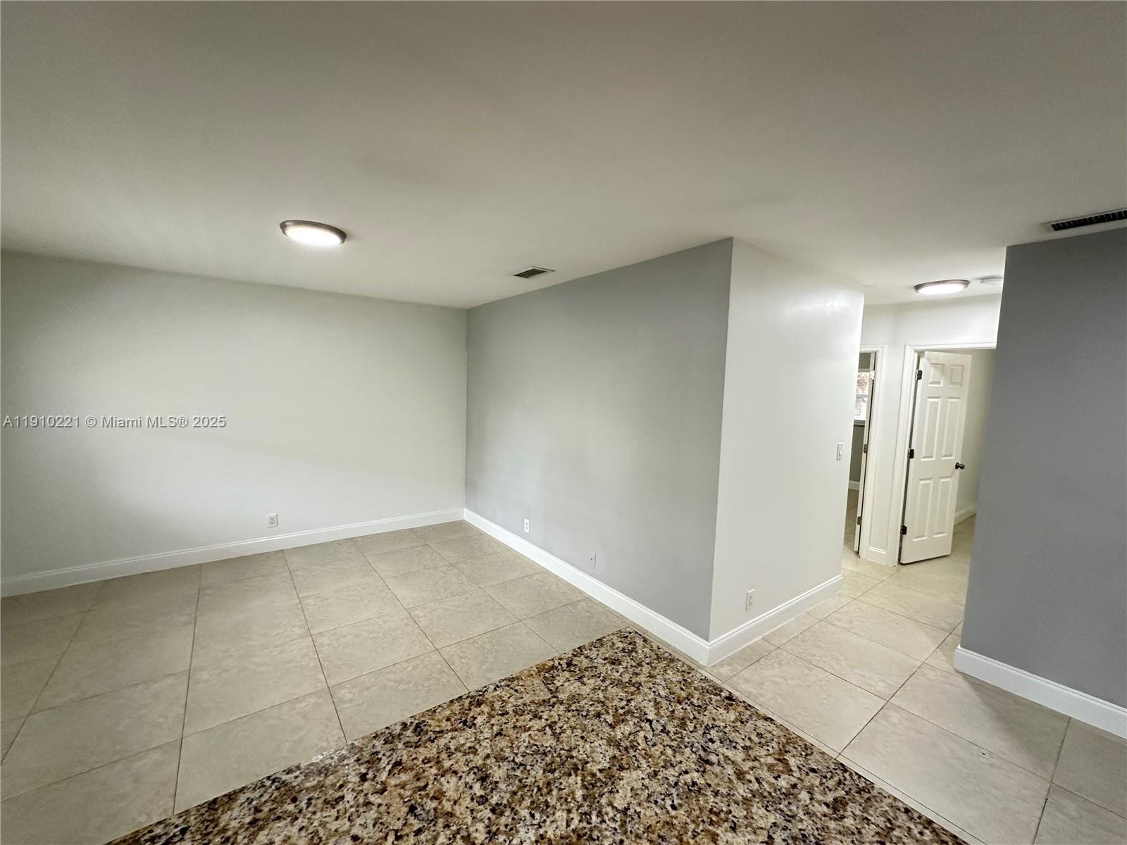 2640 Northeast 8th Avenue, Unit 13 Wilton Manors, FL 33334 - Photo 15 of 34 a view of hallway