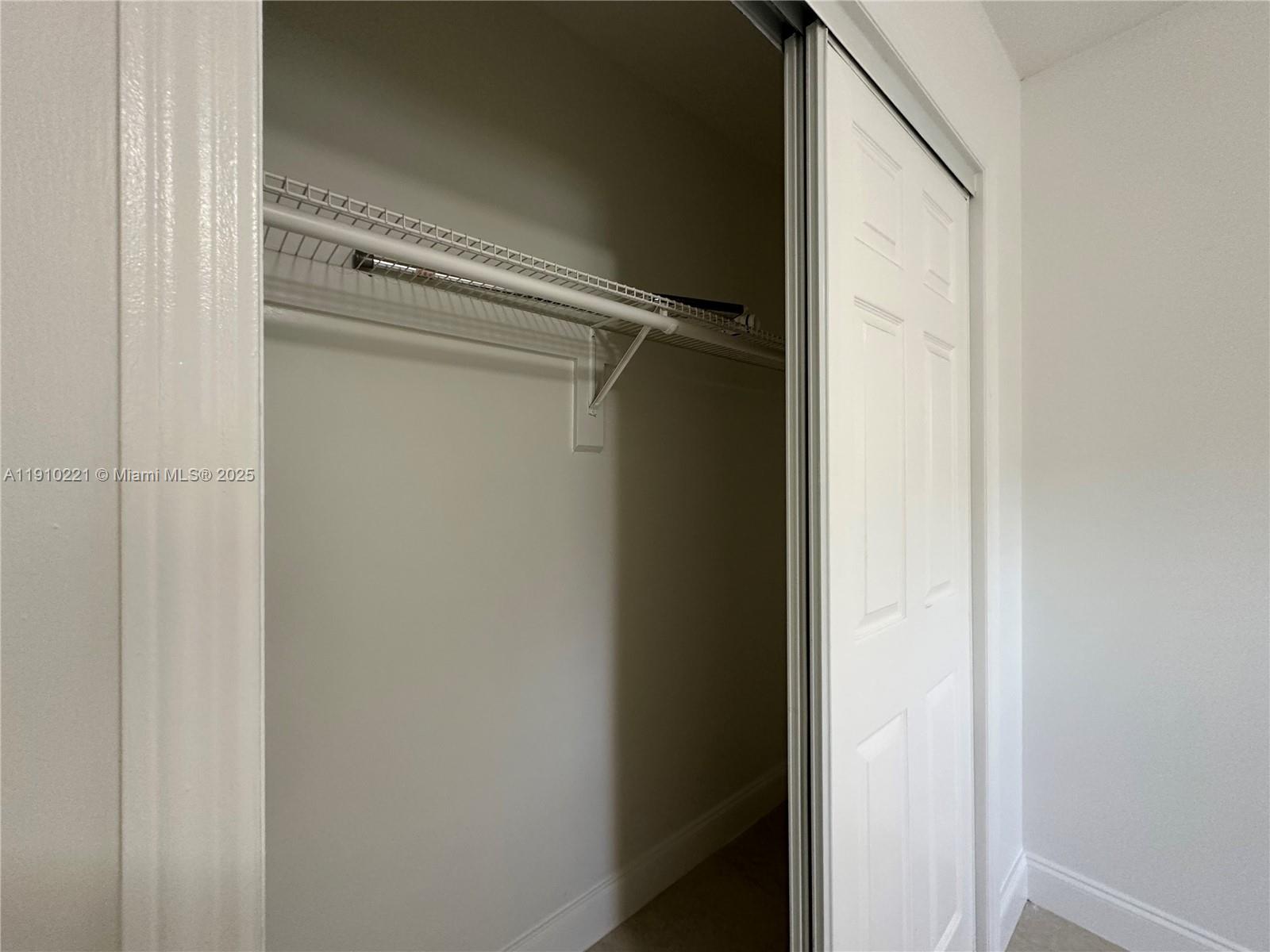 2640 Northeast 8th Avenue, Unit 13 Wilton Manors, FL 33334 - Photo 28 of 34 a view of closet