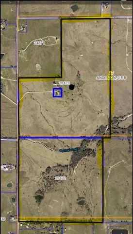 an aerial view of beach and ocean