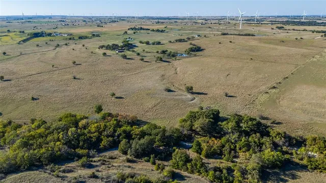 a view of a street with an ocean view