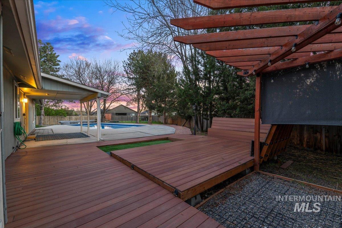 11457 Alejandro Street Boise, ID 83709 - Photo 27 of 42 Deck with a fenced backyard and a patio