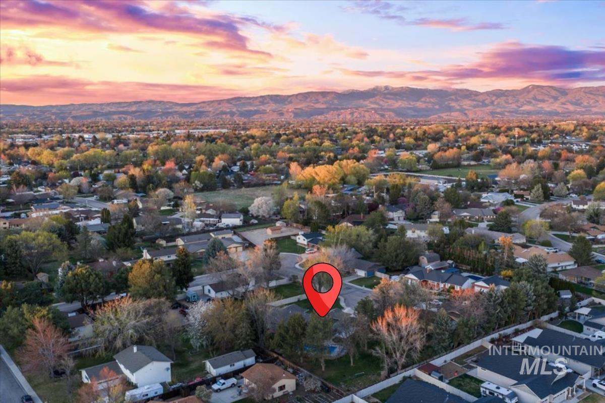 11457 Alejandro Street Boise, ID 83709 - Photo 40 of 42 Aerial perspective of suburban area featuring a mountainous background