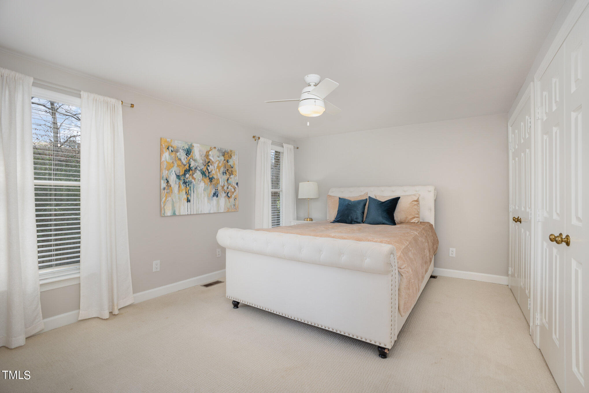 4324 Hickory Ridge Drive Raleigh, NC 27609 - Photo 22 of 34 a bed room with a bed and a painting