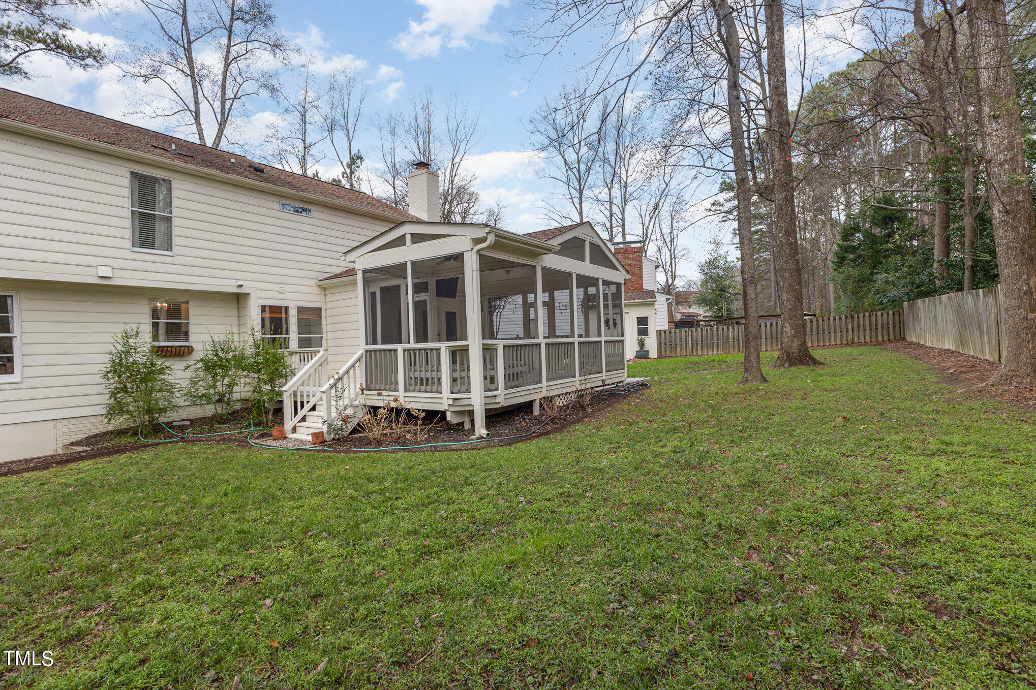 4324 Hickory Ridge Drive Raleigh, NC 27609 - Photo 27 of 34 a view of a house with a yard and sitting area