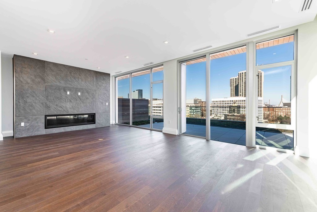 45 Temple Street, Unit PH1 Boston, MA 02114 - Photo 3 of 9 a view of a kitchen with a sink and a refrigerator