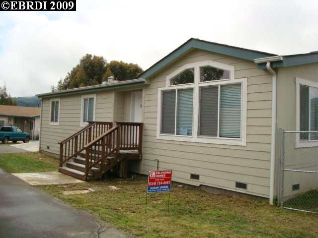 4328 Santa Rita Road El Sobrante, CA 94803 - Photo 1 of 1 a front view of a house with a yard