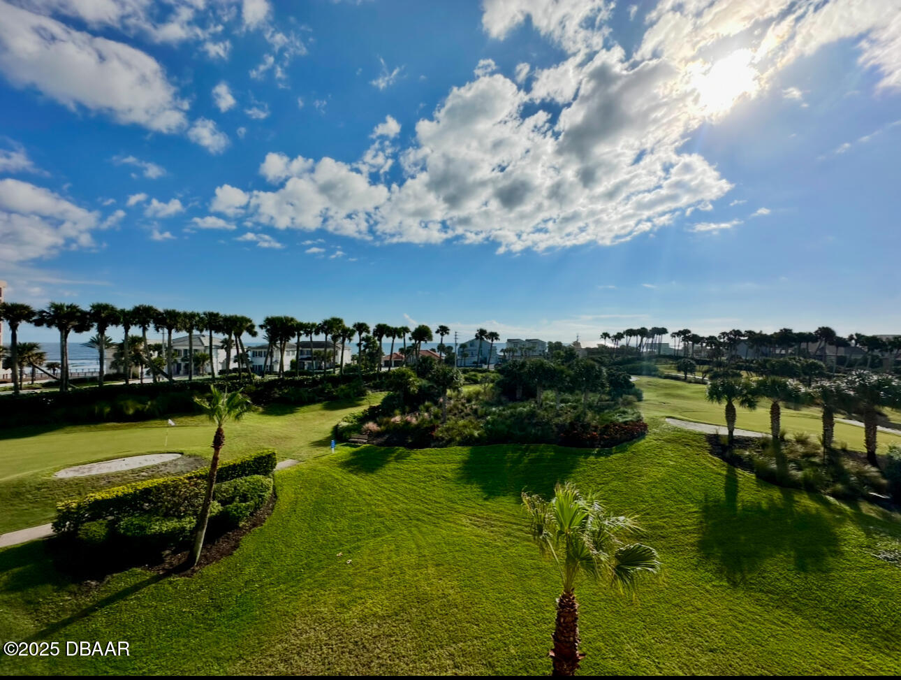 4670 Links Village Drive, Unit C404 Ponce Inlet, FL 32127 - Photo 29 of 41 a view of a lake with houses