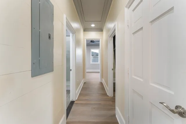 a view of bathroom with a sink and mirror