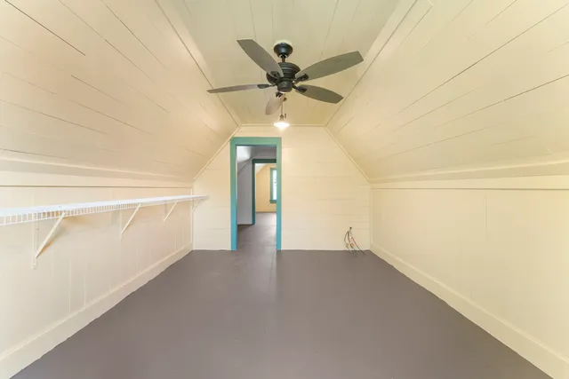 a hallway with a washer and dryer