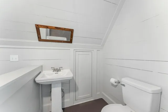 a view of a storage & utility room with a washer dryer