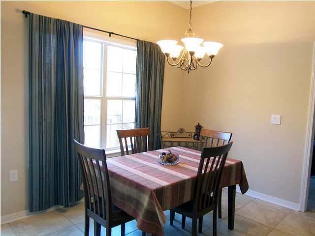 435 Ridge Lake Road Crestview, FL 32536 - Photo 4 of 16 a view of a dining room with a table and chairs