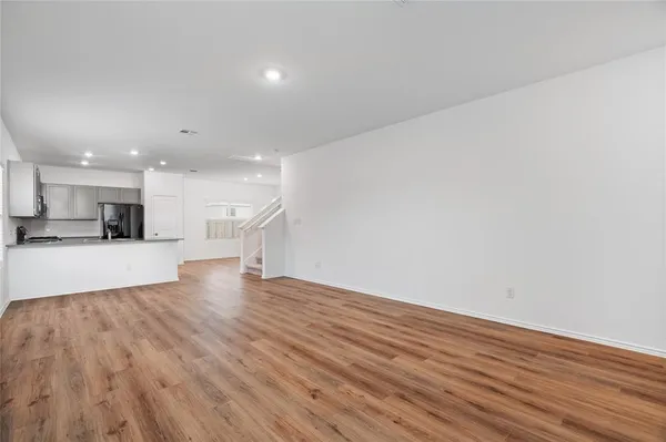 a view of kitchen with wooden floor