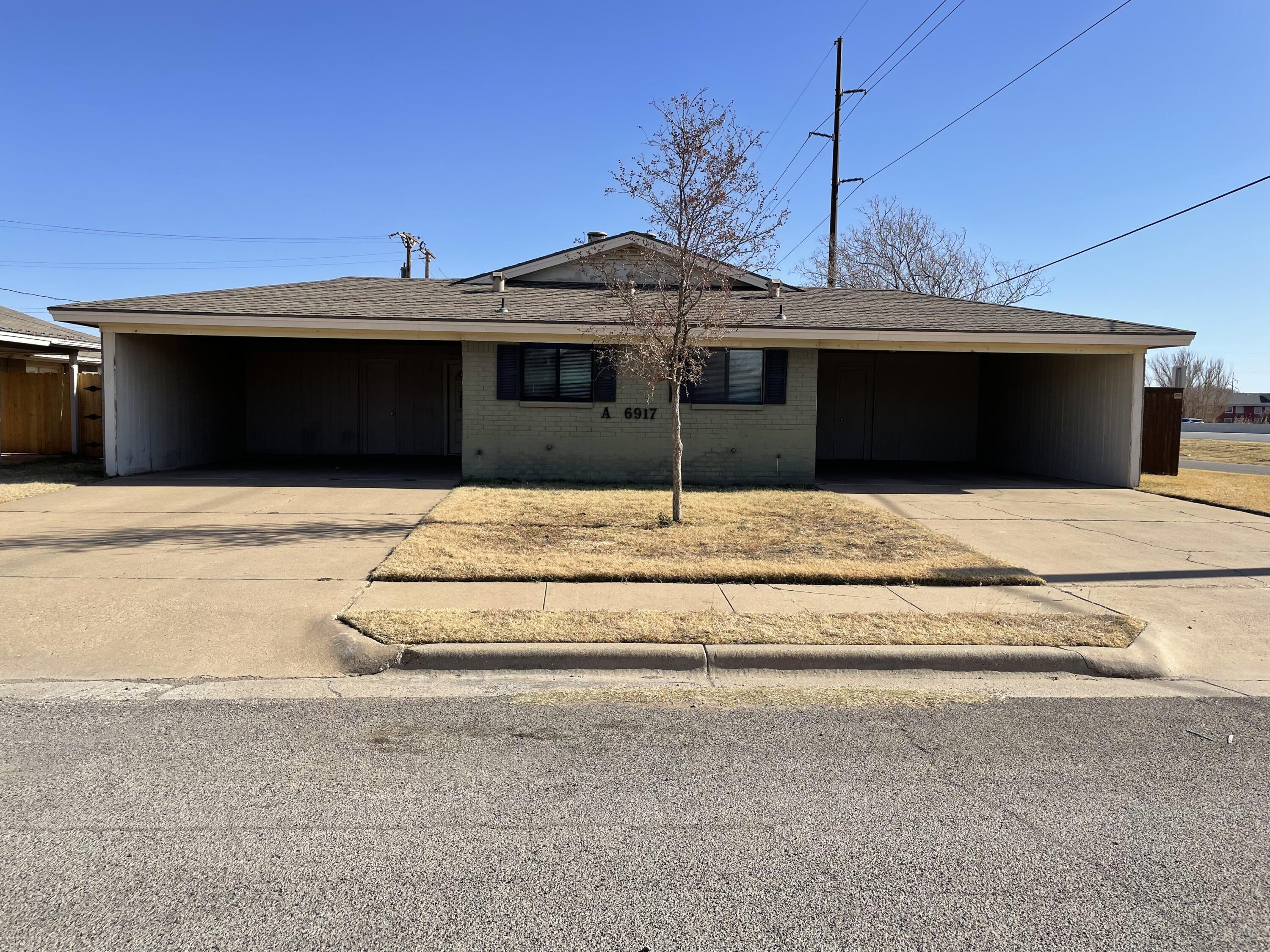 6917 Fremont Avenue Lubbock, TX 79413 - Photo 1 of 9 a house view with a outdoor space