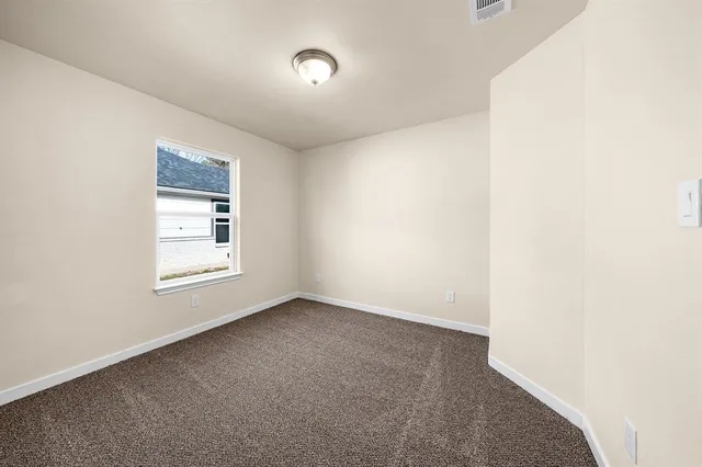 an empty room with a window