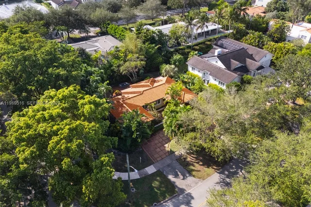an aerial view of residential house with outdoor space