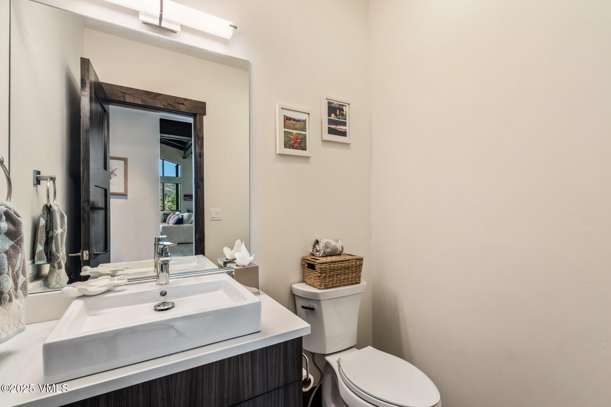 92 Edwards Pointe Edwards, CO 81632 - Photo 28 of 74 a bathroom with a sink a toilet and mirror