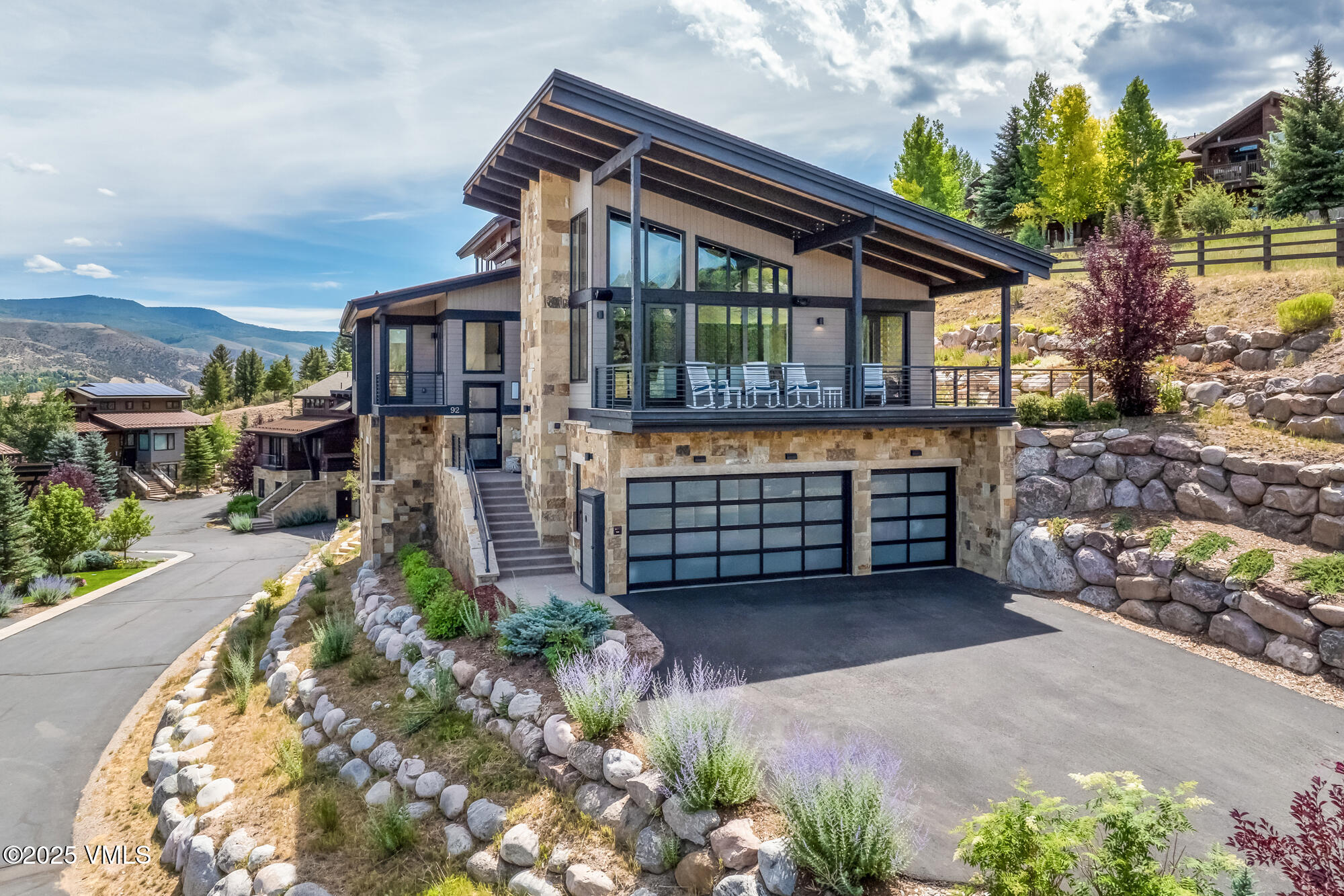 92 Edwards Pointe Edwards, CO 81632 - Photo 56 of 74 a view of a house with brick walls and flower plants