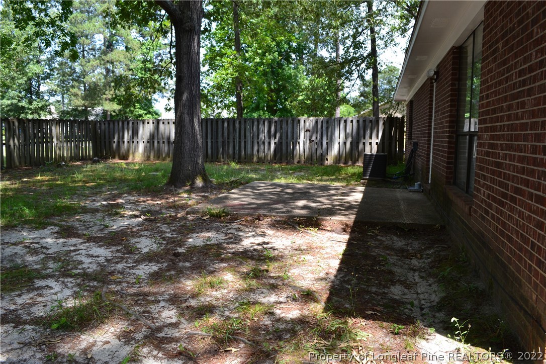 982 Rim Road Fayetteville, NC 28314 - Photo 20 of 20 a view of a backyard with green space