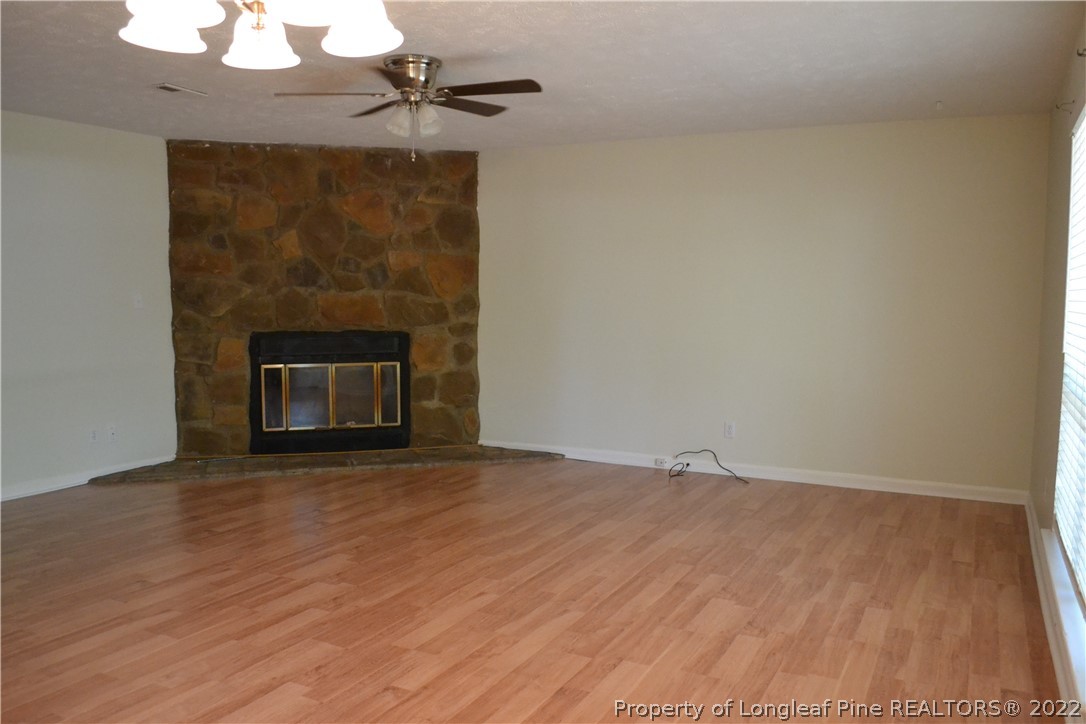 982 Rim Road Fayetteville, NC 28314 - Photo 7 of 20 a view of empty room with a fireplace