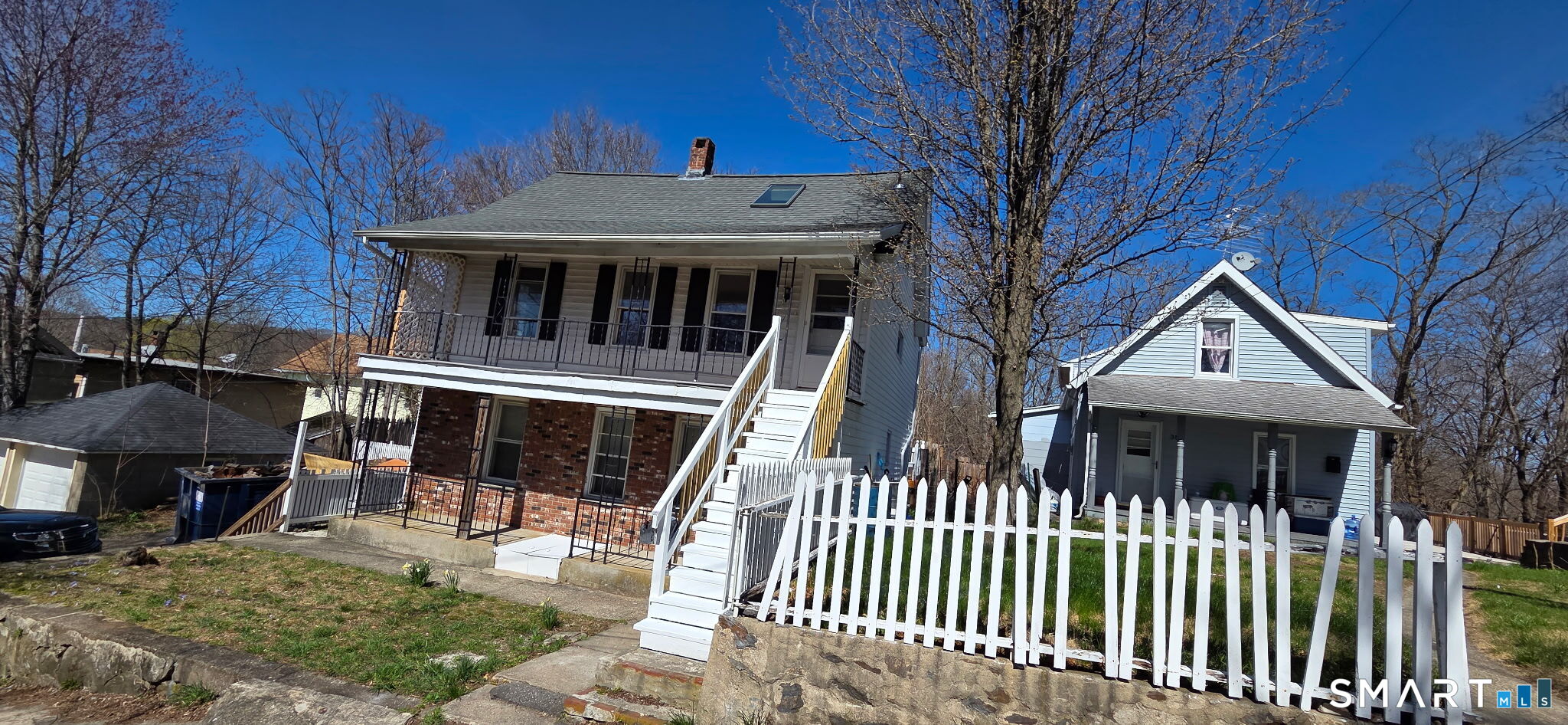 36 Reynolds Street Norwich, CT 06360 - Photo 2 of 17 a front view of a house with a porch