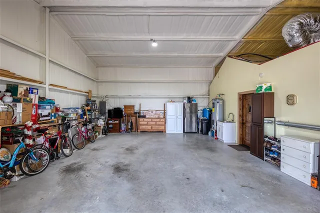 a view of a bike storage and utility room