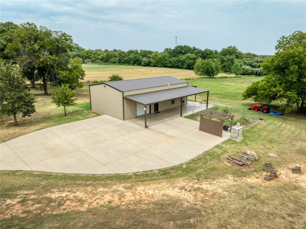 210 Spring Branch Trail North Springtown, TX 76082 - Photo 22 of 36 a view of a swimming pool and lake view