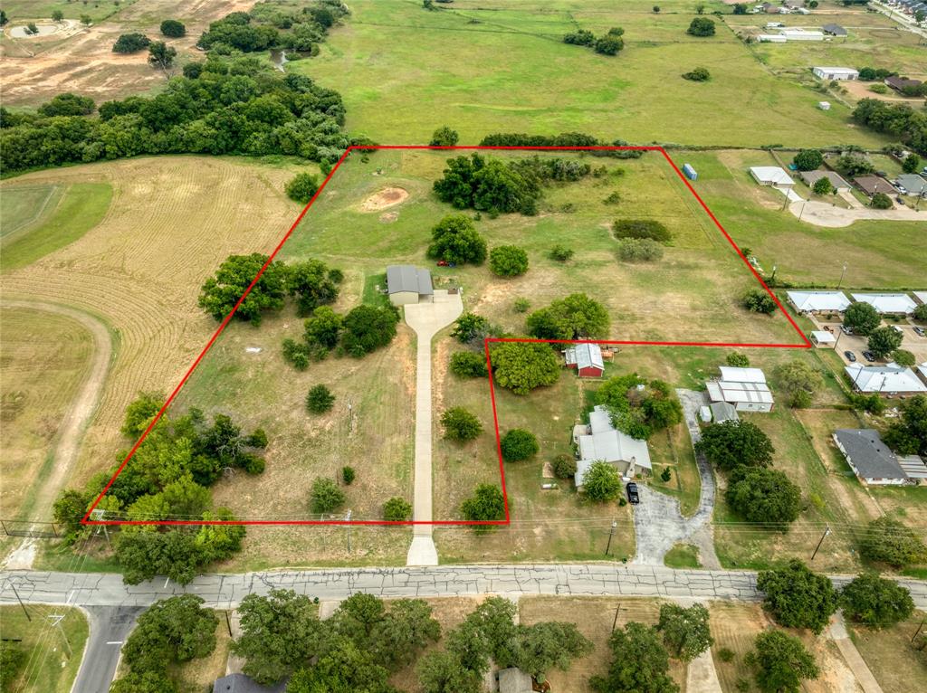 210 Spring Branch Trail North Springtown, TX 76082 - Photo 29 of 36 a view of a swimming pool with a yard