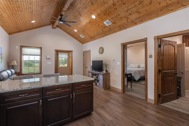 a open kitchen with sink refrigerator and cabinets