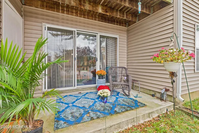 a backyard of a house with seating space