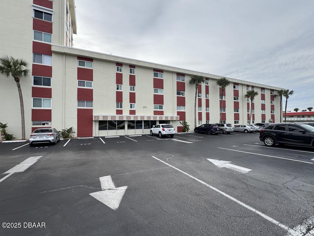 2711 North Halifax Avenue, Unit 385 Daytona Beach, FL 32118 - Photo 1 of 18 a view of parking area